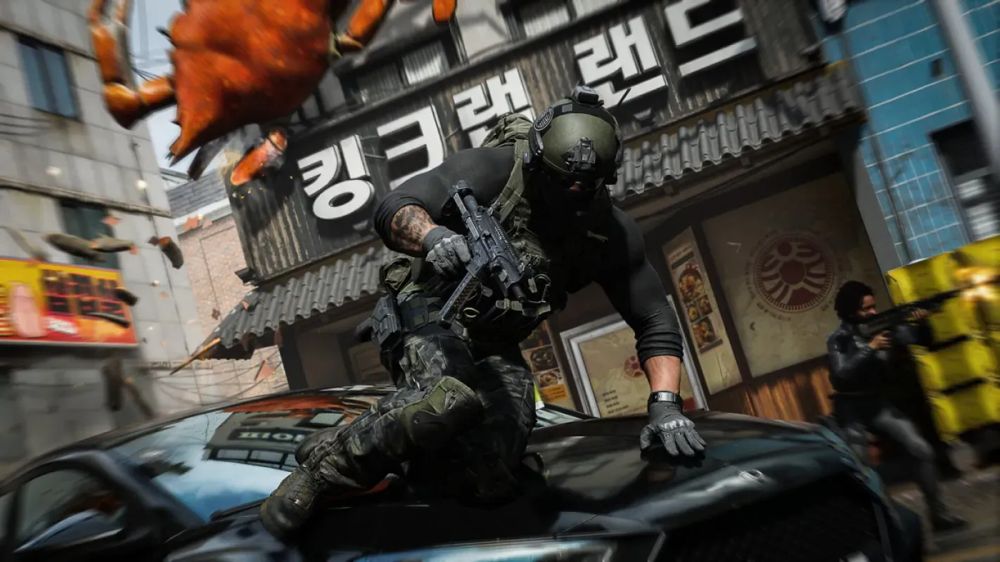Soldado em combate numa rua de cidade sul-coreana com letreiros em coreano em Modern Warfare 4