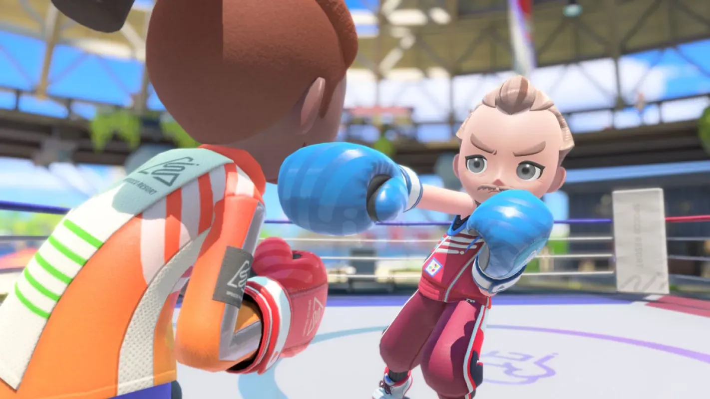Dois personagens trocam socos em um ringue de boxe