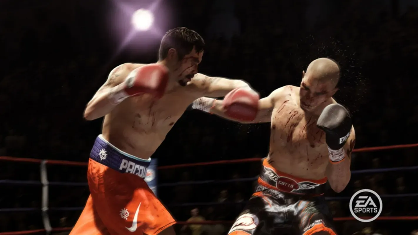 Dois boxeadores trocam golpes no ringue em Fight Night Champion