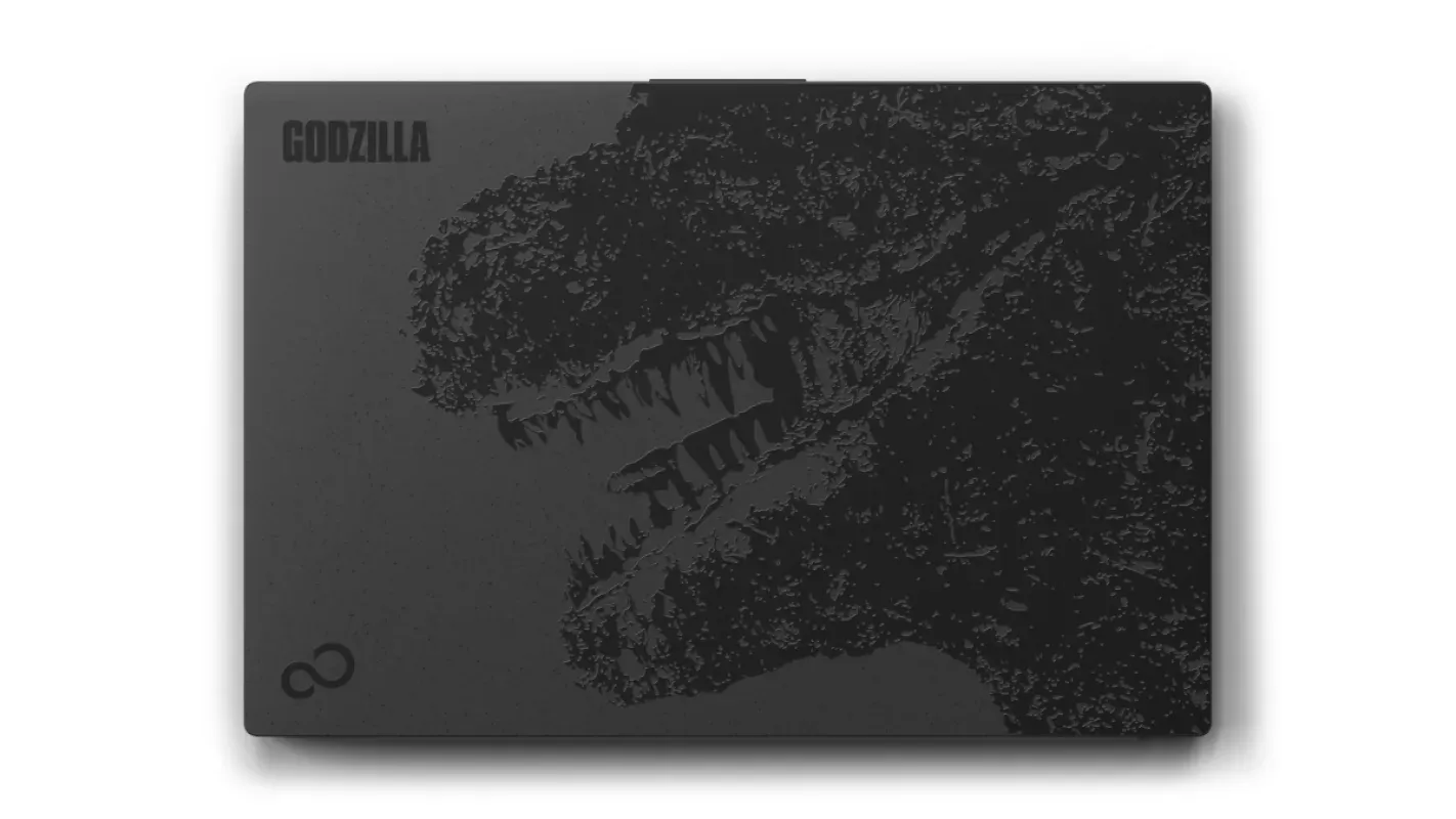 Tampa preta do notebook FMV Zero GODZILLA EDITION com o desenho de Godzilla em preto